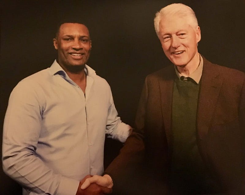 Marvin Peake with Bill Clinton}
